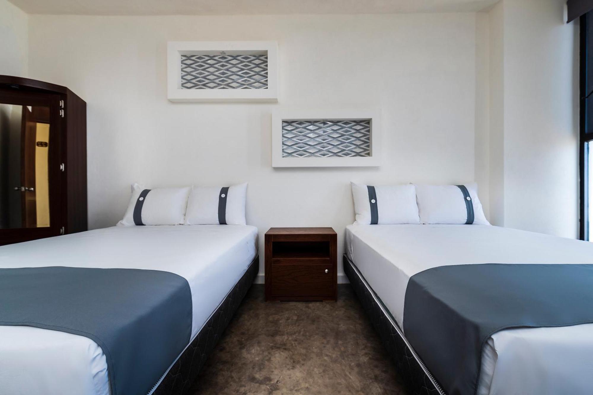 Capital O Hotel Joyma Suites, San Luis San Luis Potosí Esterno foto
