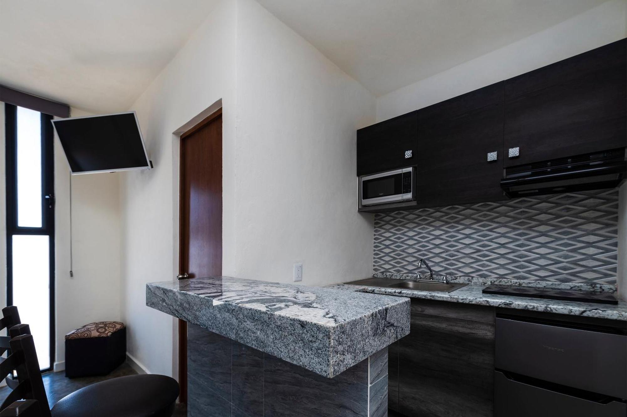 Capital O Hotel Joyma Suites, San Luis San Luis Potosí Esterno foto